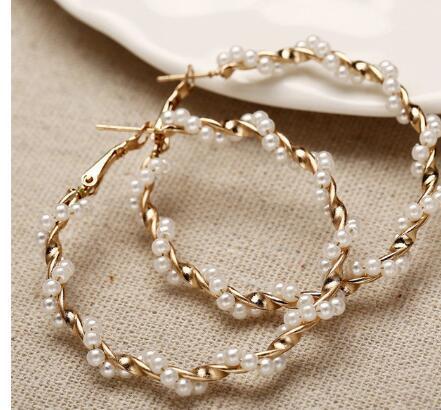 Pearls wrapped around ear rings , Hina khan style