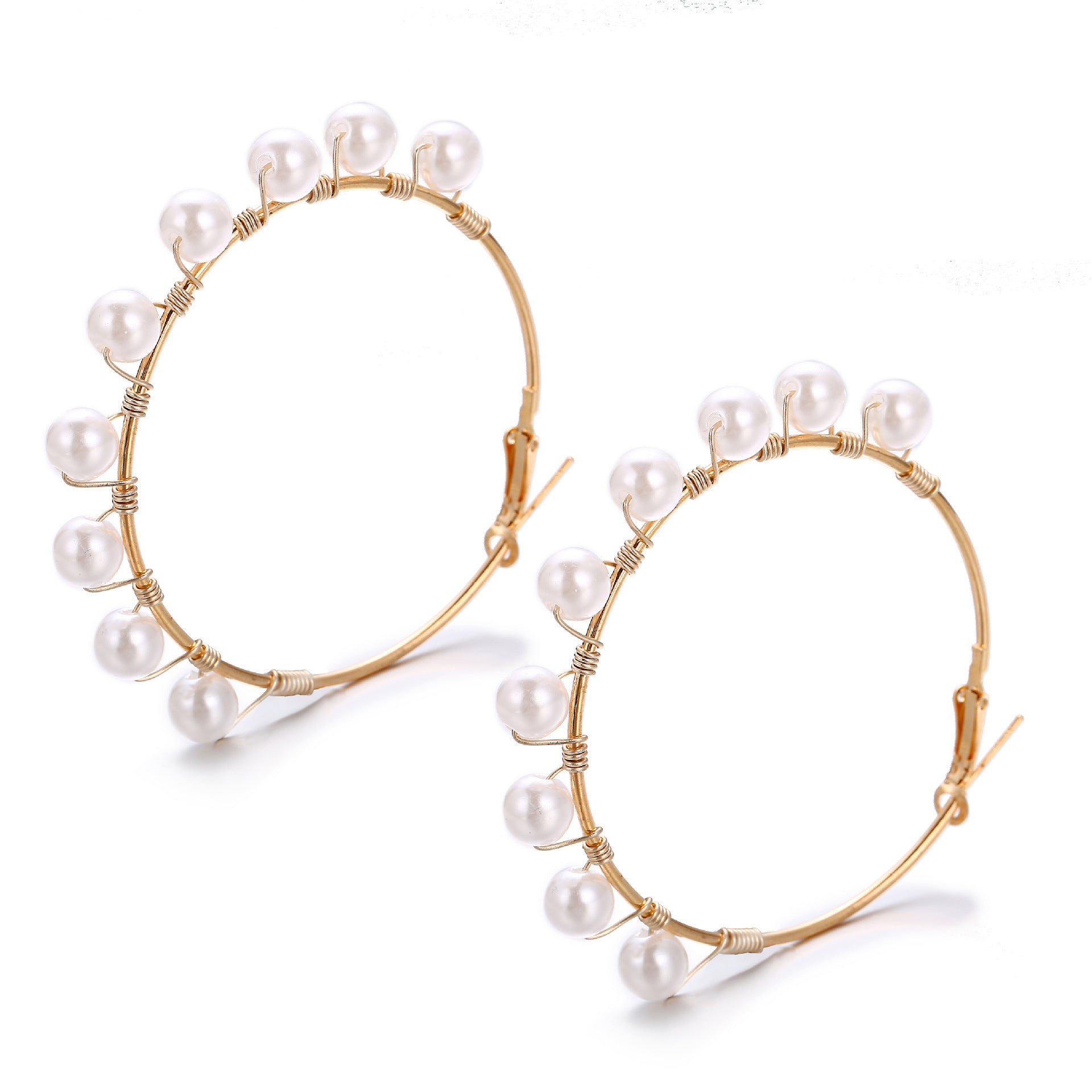 Pearls wrapped around ear rings , Hina khan style