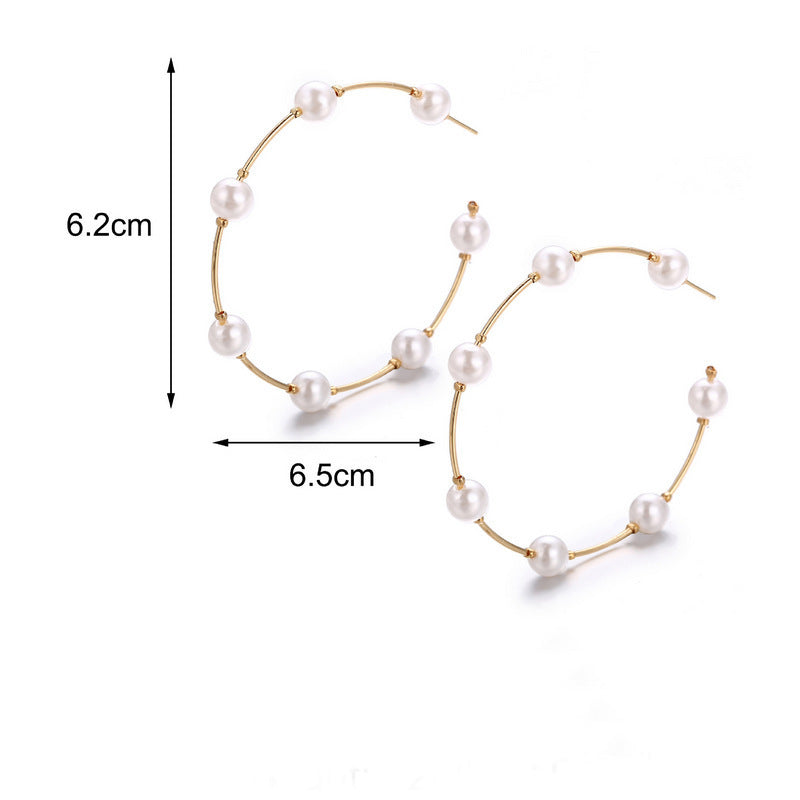 Pearls wrapped around ear rings , Hina khan style